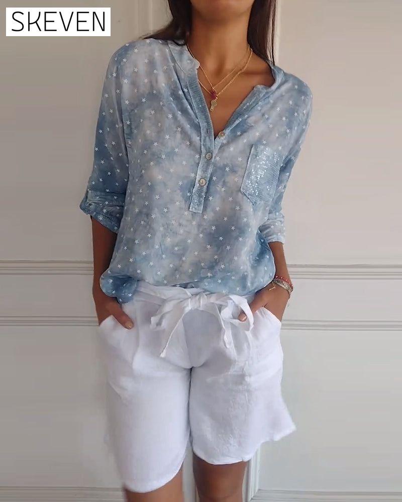 Star print button v-neck blouse