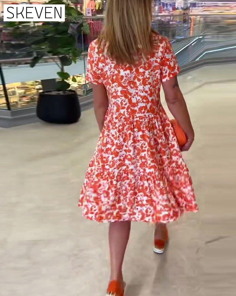 Kurzärmeliges geblümtes Midikleid