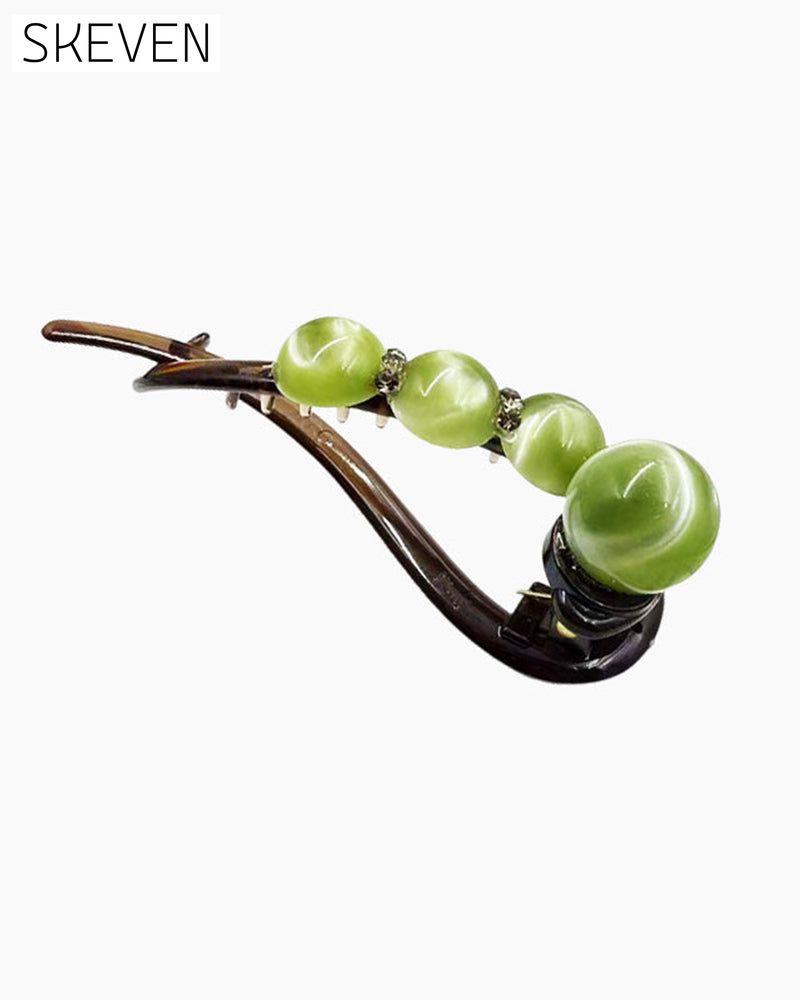 Elegante Haarspange für nach hinten gekämmte Frisuren