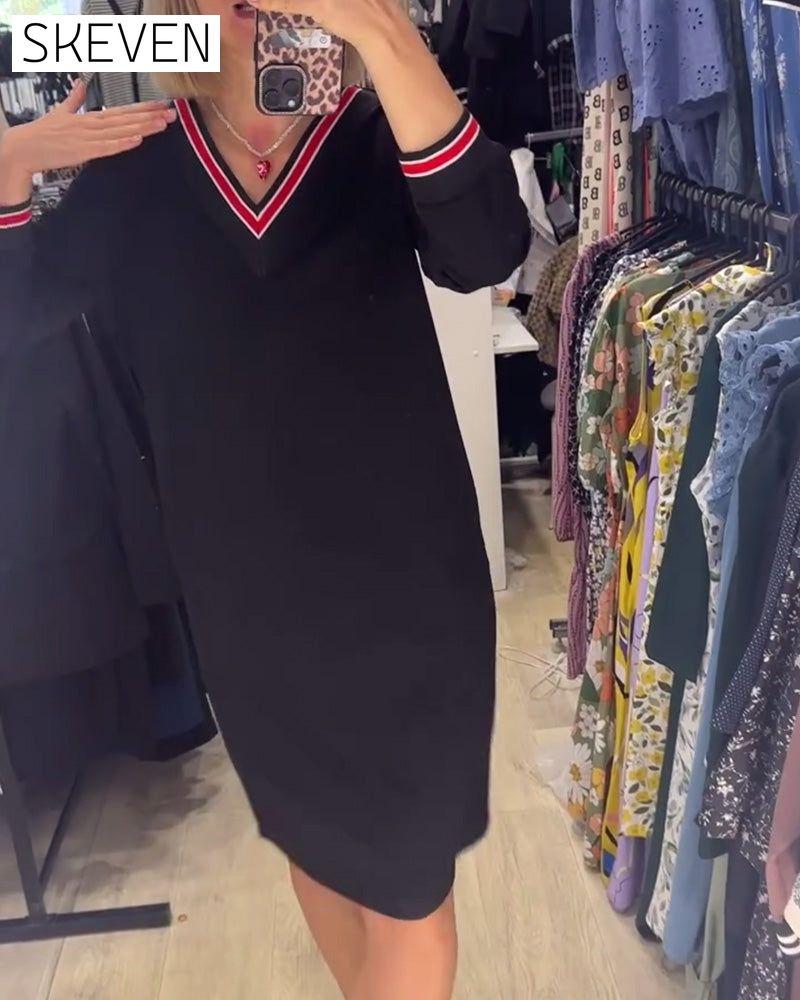 Robe élégante à col en V avec poches