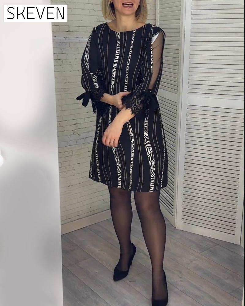 Knee-length striped dress