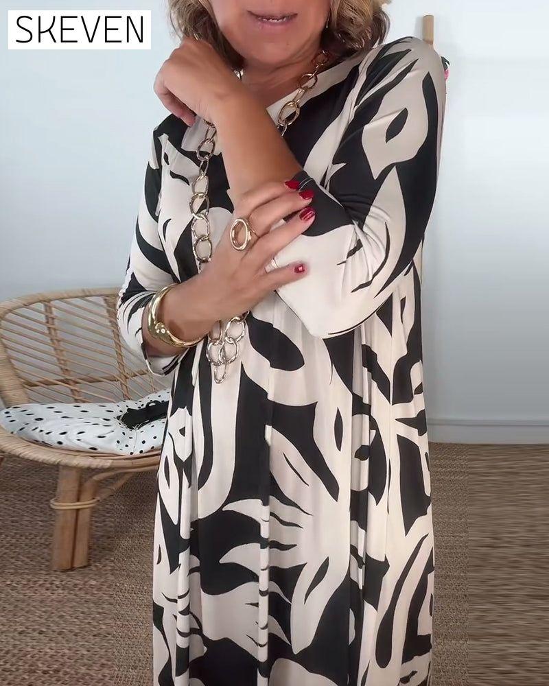 Bedrucktes Kleid mit Rundhalsausschnitt und langen Ärmeln