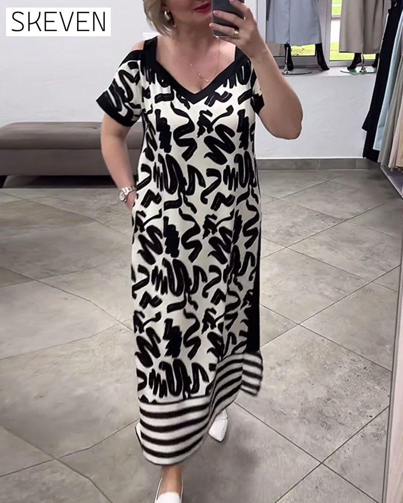 Kurzärmeliges, schulterfreies Kleid mit Print