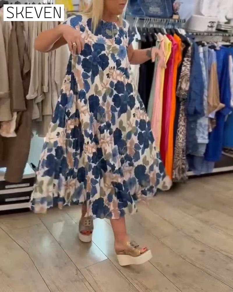 Elegantes Kleid mit Rundhalsausschnitt und Blumenmuster
