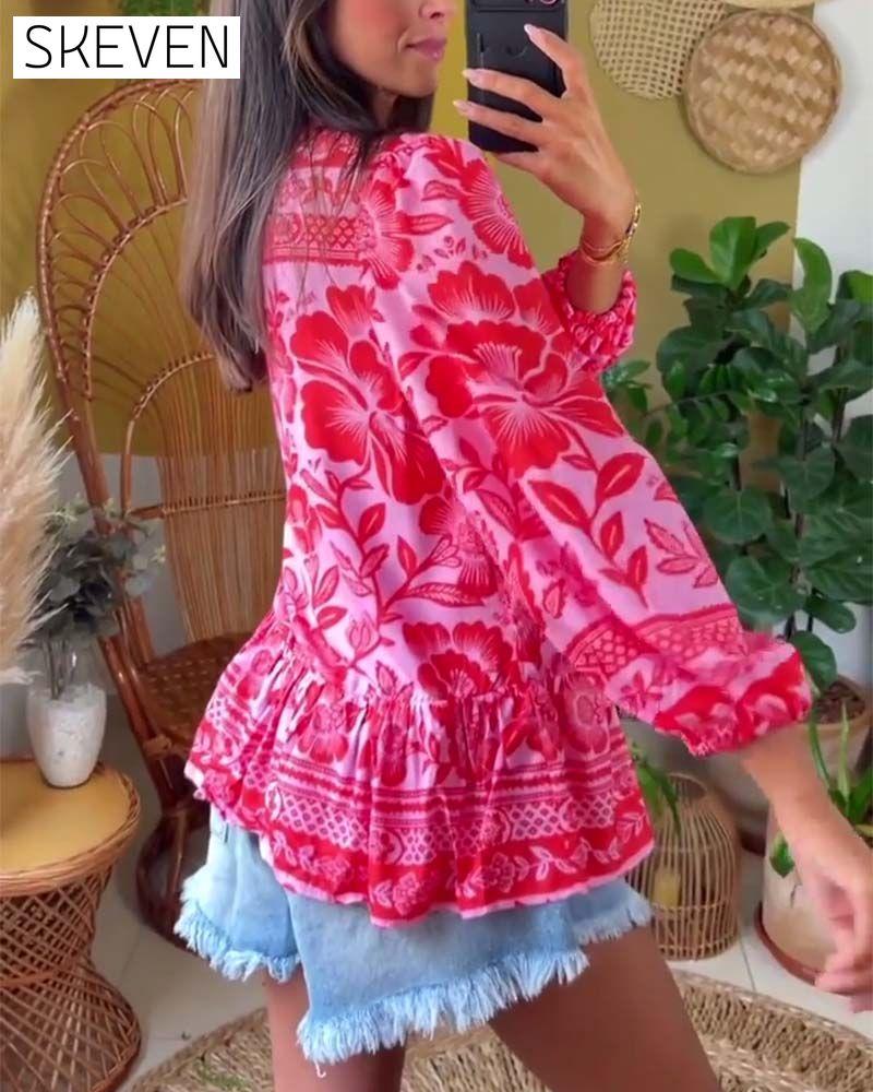 Floral print deep V blouse