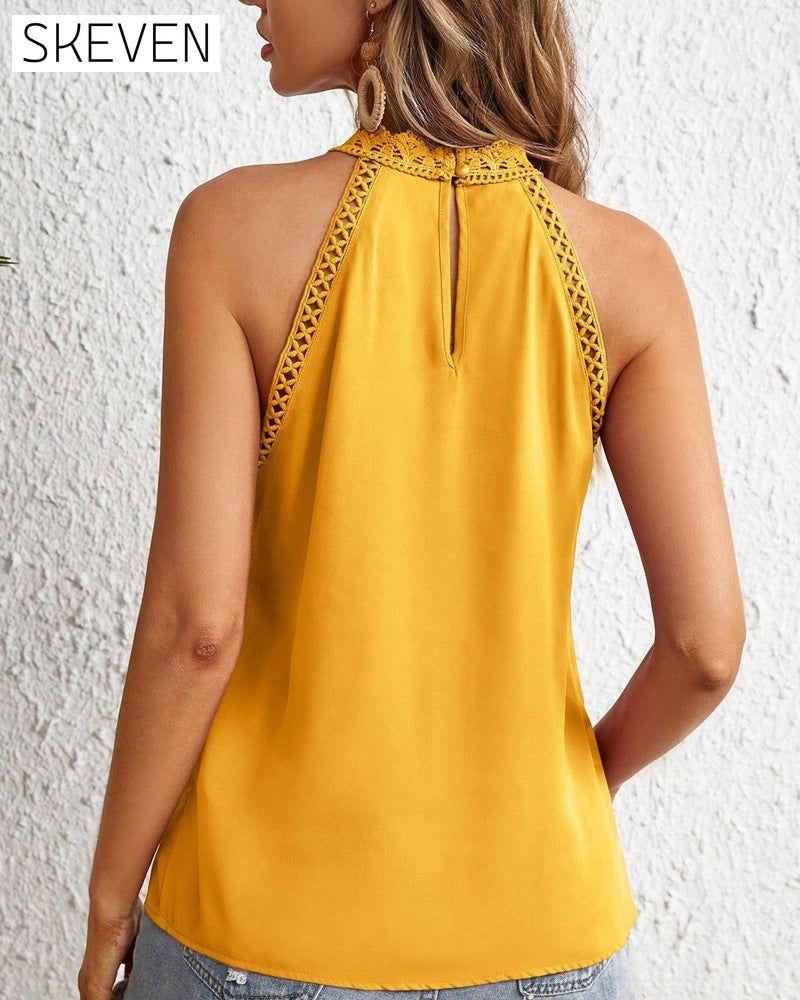 Gilet sans manches en dentelle ajourée couleur unie