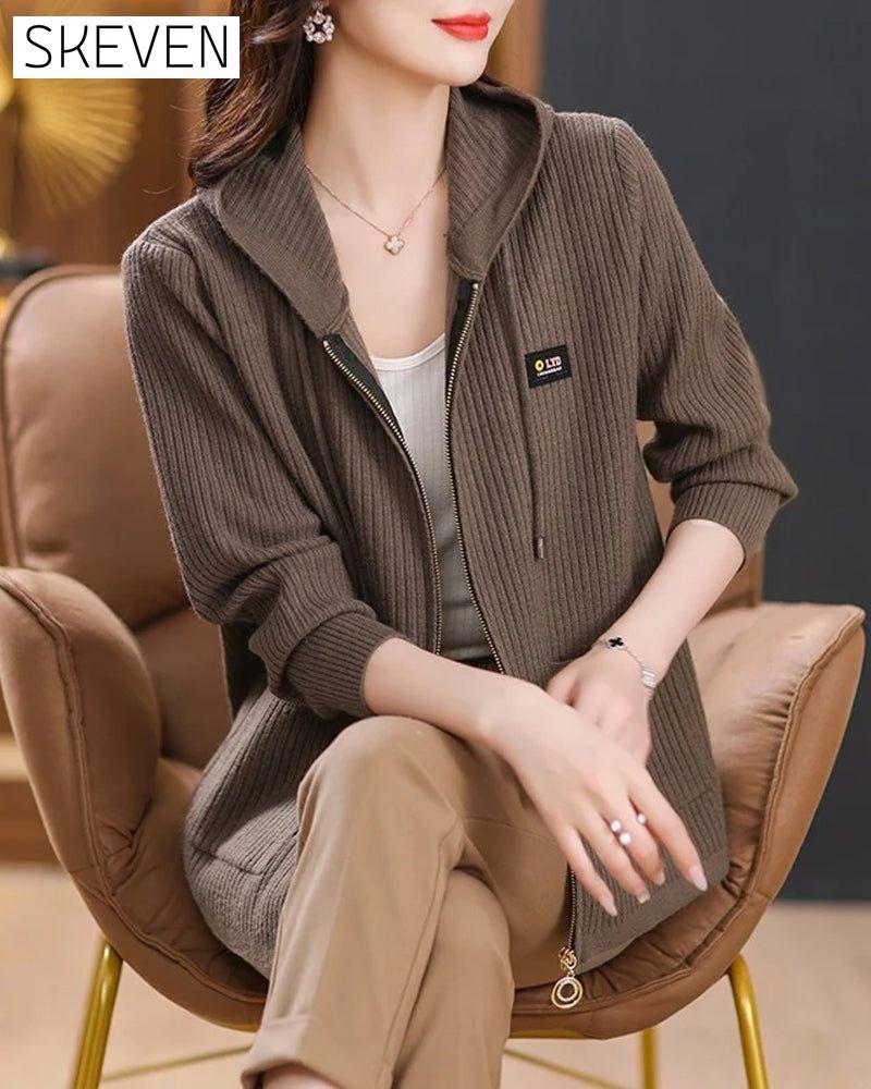 Jacket With Hooded Zipper Closure