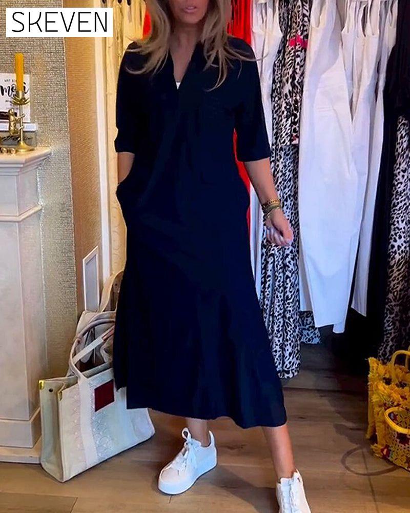 Kleid mit V-Ausschnitt und Taschen