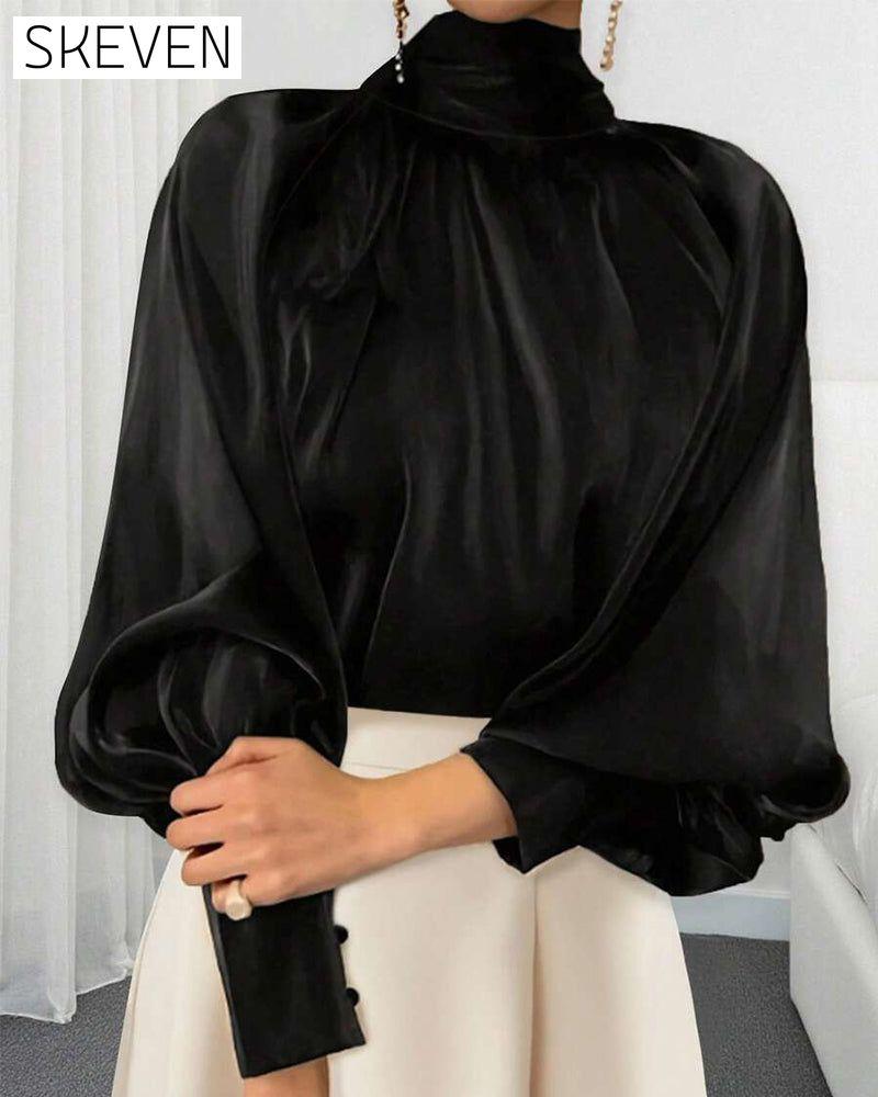 Bluse mit Laternenärmeln und hohem Kragen