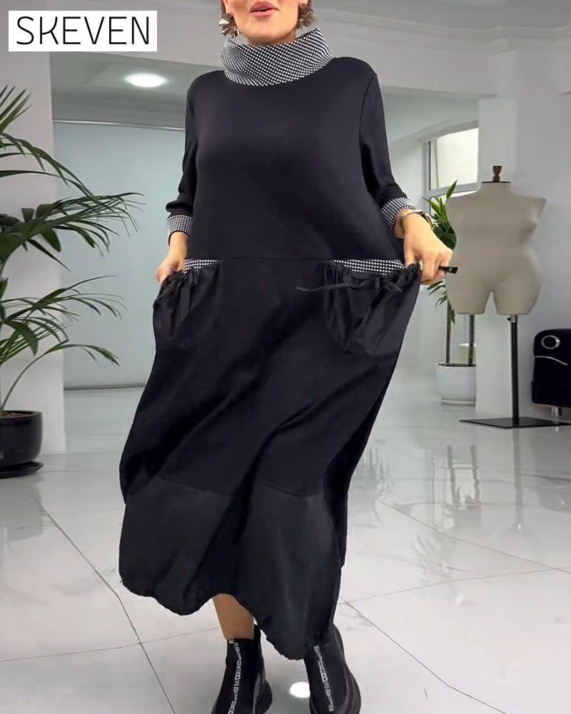 Lässiges Kleid mit Karomuster, hohem Kragen und Taschen