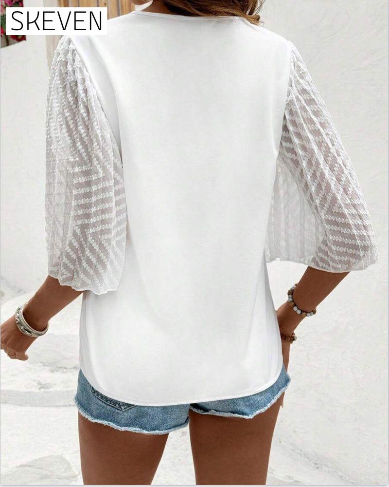 Locker geschnittene Bluse mit V-Ausschnitt in Unifarbe