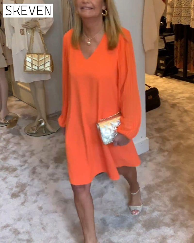 einfarbiges Kleid mit Laternenärmeln und V-Ausschnitt