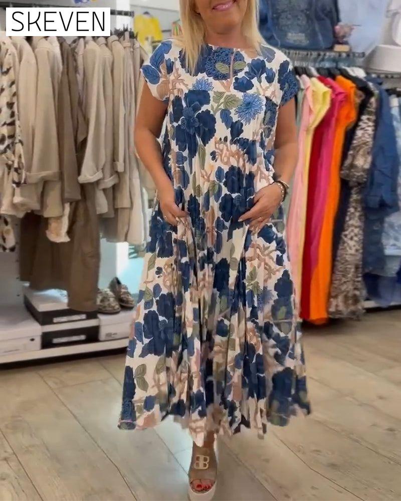 Elegantes Kleid mit Rundhalsausschnitt und Blumenmuster