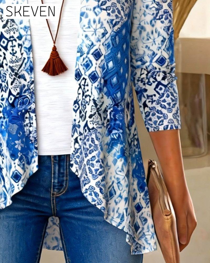 Bedruckte, asymmetrische Bluse in Zweiteiler-Optik