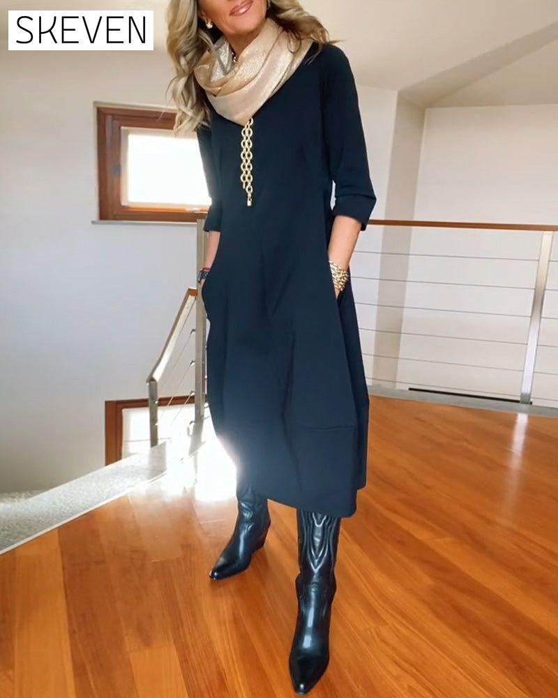 Elegantes, einfarbiges Kleid mit Rundhalsausschnitt und Taschen