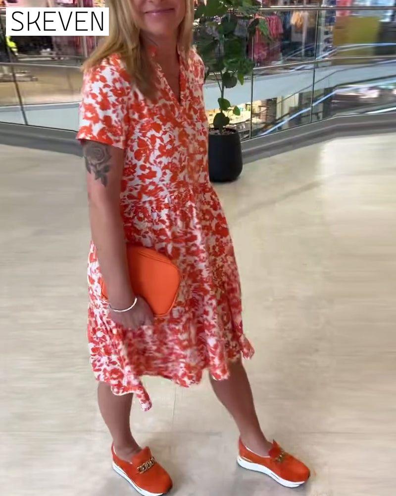Kurzärmeliges geblümtes Midikleid
