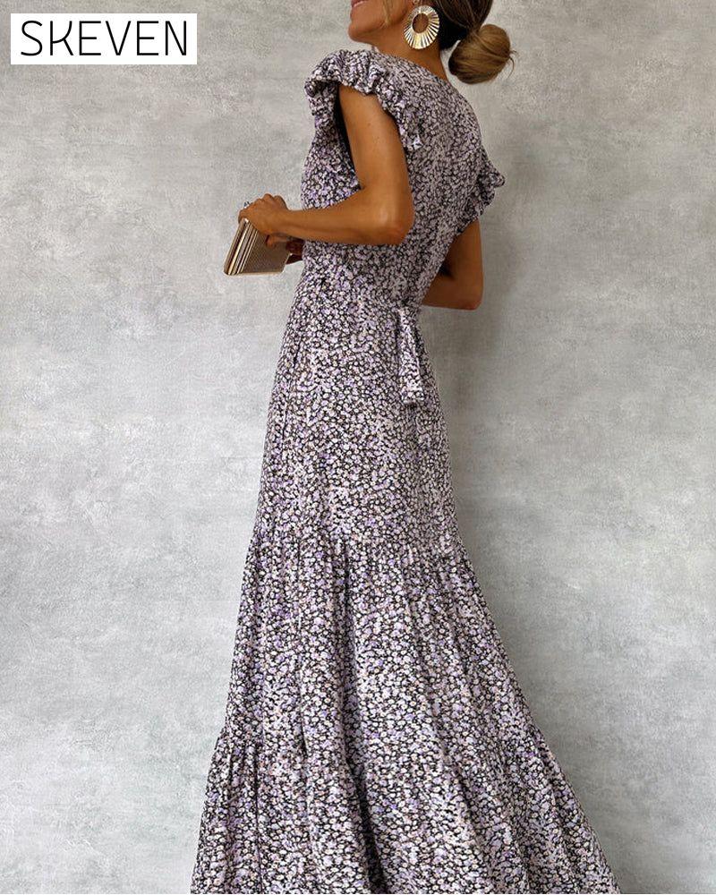 Robe élégante à manches à volants et fente
