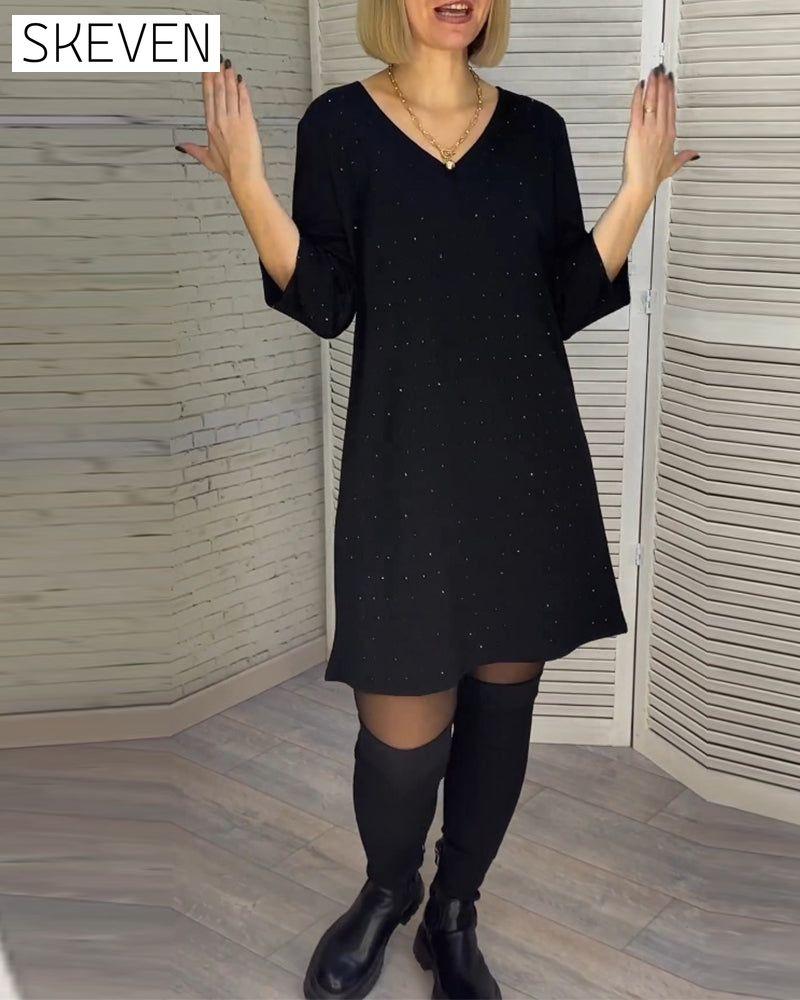 Robe élégante à col en V et manches trois-quarts