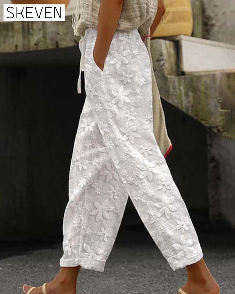 Floral embroidered lace-up solid color casual pants
