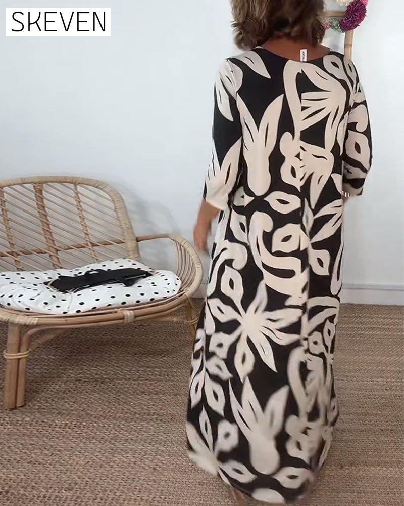 Bedrucktes Kleid mit Rundhalsausschnitt und langen Ärmeln