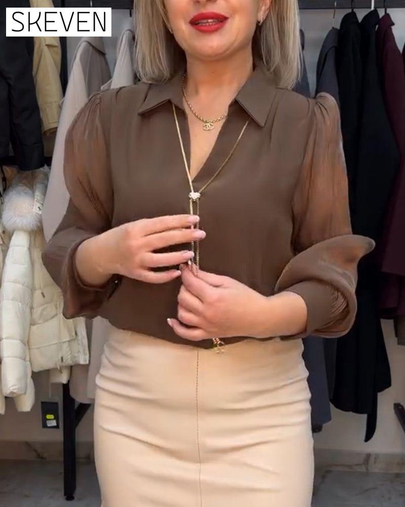 Elegante, transparente Bluse mit Kragen und Puffärmeln