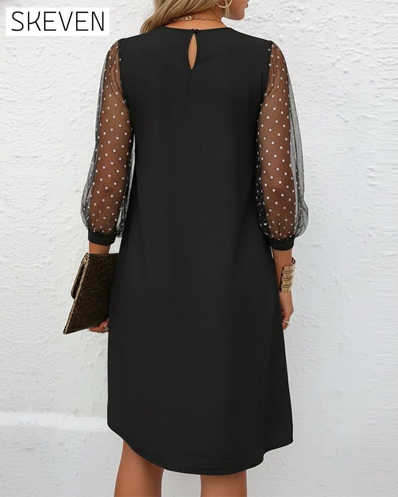 Figurformendes Kleid aus Mesh mit V-Ausschnitt