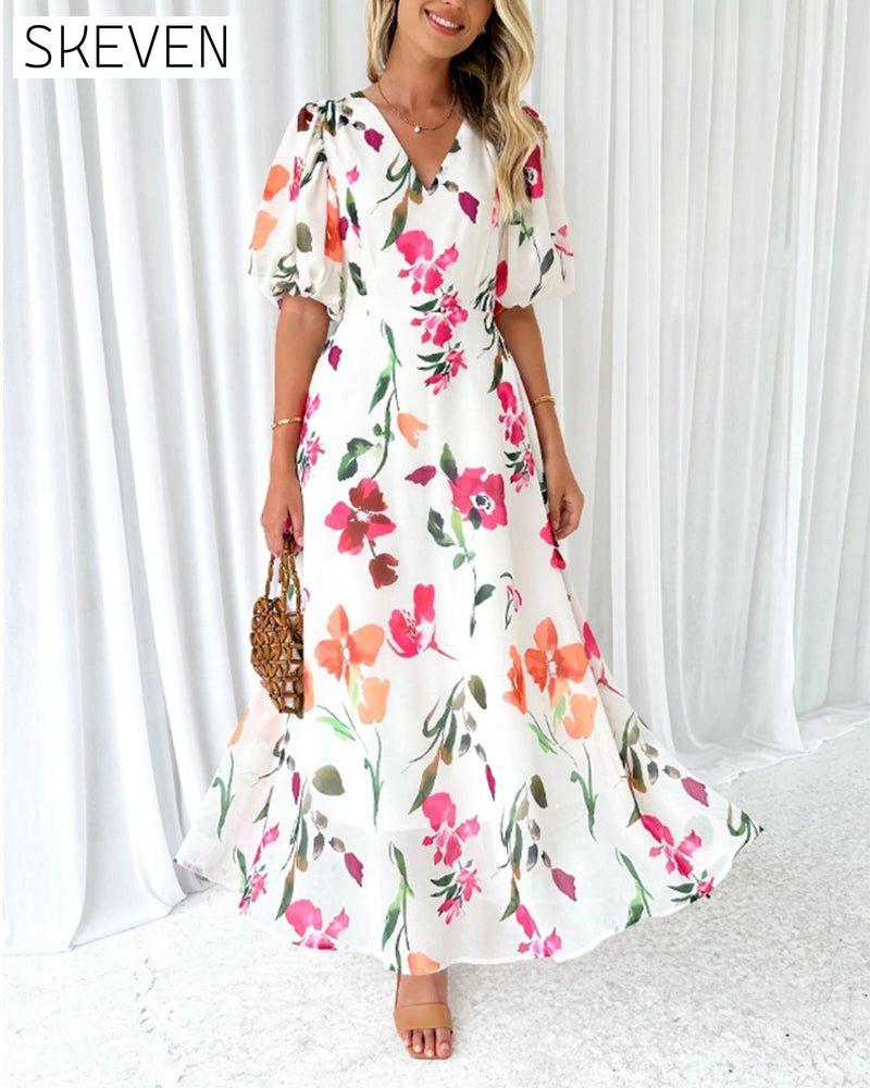 Elegantes Kleid mit Puffärmeln und Blumenmuster