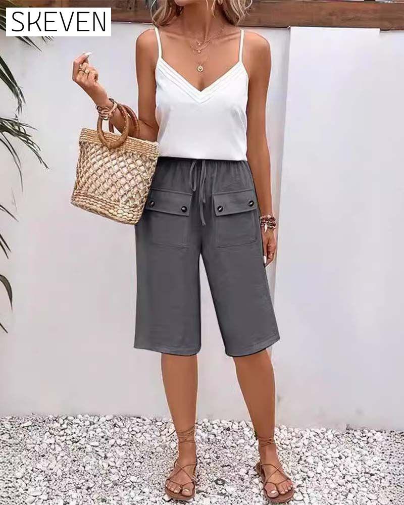 Casual solid color pocket half length trousers