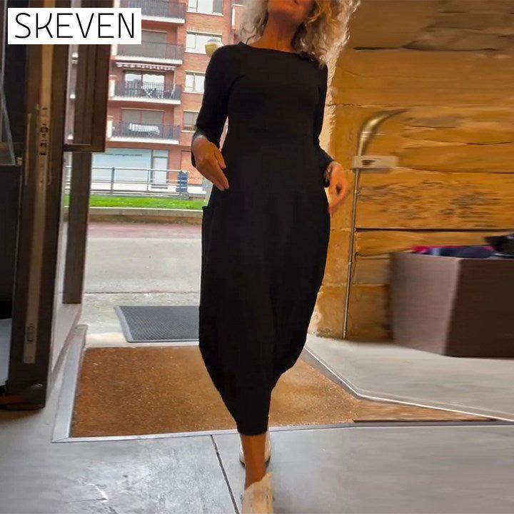 Solid color round neck long sleeve pocket dress